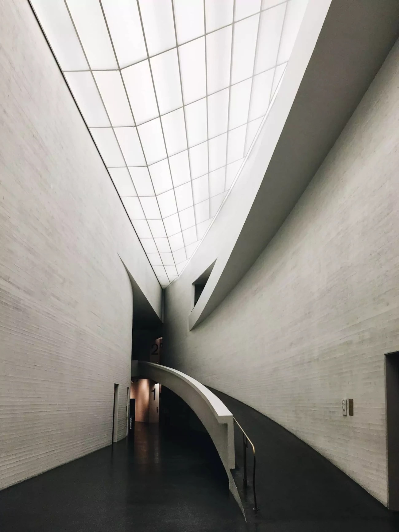 HOME A ramp along a curved wall in the Kiasma Museu, Helsinki, Finland
